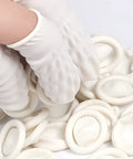 Close-up of Top Shelf Anti Static Fingertip Protectors White Latex Finger Cots being handled, ideal for electronics repair.