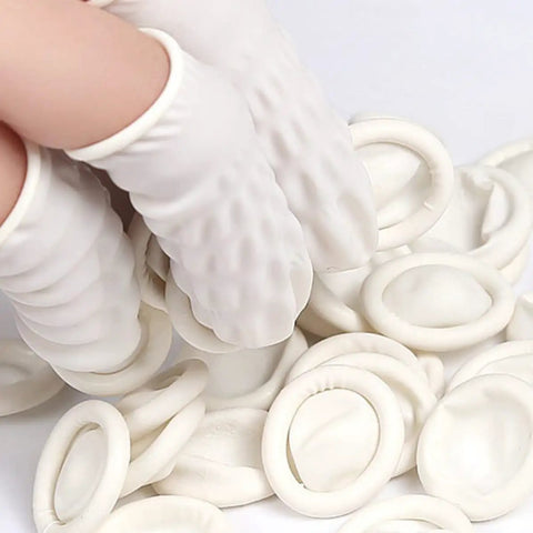 Close-up of Top Shelf Anti Static Fingertip Protectors White Latex Finger Cots being handled, ideal for electronics repair.