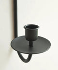 Close-up view of Super Rock Solid Iron Wall Candle Sconces Set Of Two Matte Black Metal Hanging Mount for modern decor.