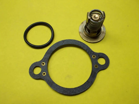 Marine Thermostat Kit With Gasket For OMC And Volvo Penta Engines Fits 4.3L 5.0L 5.7L 5.8L V6 V8 Ford And Chevy Marine Applications Replacement Part That Lasts featuring a thermostat, gasket, and O-ring on a yellow background