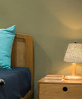Bedroom setup with Black Linen Cone Barrel Lamp Shade Set Of 2 For Floor And Table Lamps, 7x14x9 Inches, on wooden table lamp.