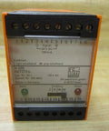 Dn001 Power Supply Switching Amplifier 110 V AC Netzteil Module For Industrial Automation, Used Good Condition, Dn0012 Pro Grade Controller For PLC Systems And Sensors, Heavy Duty Build, Ready To Install. Front view of orange and black 110 V AC industrial power supply module, 3 x 3 x 5 in.