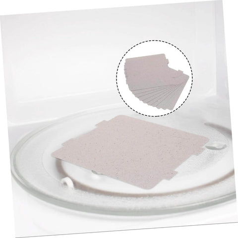 Close-up of 10 Pack Microwave Waveguide Cover Mica Sheets Universal Fit For Heat Insulation And Repair on microwave turntable
