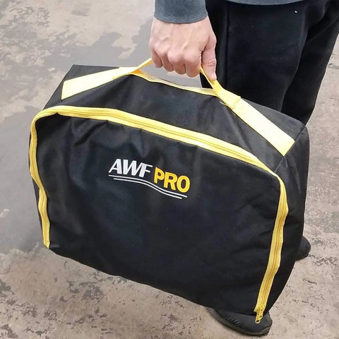 Heavy Duty Portable Spill Kit For Truckers Featuring A Real Deal 31 Piece Cleanup Set stored in rugged nylon bag with handles.