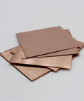 Single Sided Copper Clad Laminate Kit Packed With 10 Prototyping Boards 7 By 10 Cm For DIY PCB Etching stacked neatly