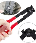 Close-up of CV Boot Clamp Pliers Kit Set 10 Pack Stainless Steel Universal Adjustable with red handle in use