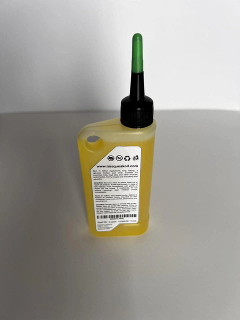 Bottle of High Performance Penetrating Oil For Bike Chain Lubrication Door Hinges And Locks Rust Removal A Multi Purpose Non Toxic Lubricant