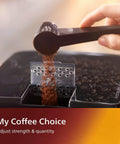 Ready To Roll Black Fully Automatic Espresso Machine With Zero Hassle Bean To Cup Brewing And Slick Touch Panel For Iced Coffee Or Five Daily Grind Favorites Plus Quick Clean Lattego Milk Frother pouring coffee grounds.