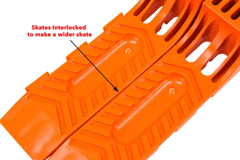 Two Ton Snatch Block With Chain For Tow Trucks And Wreckers 3 Inch Sheave Three Eighths Inch Wire Rope Grease Fittings Four Pack Interlocking Tire Skates For Rollback Wrecker Car Carrier Safety Orange showing interlocked skates.