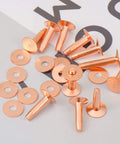 Copper Rivets And Burrs Kit, 20 Pieces In 14mm And 19mm displayed on a white surface for DIY leather crafting projects
