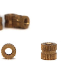 Brass M3 knurled threaded inserts showing front and side views for heat set applications, part of the M3 Knurled Threaded Inserts Brass Heat Set Nuts Kit 300Pcs Assortment For Laptop, 3D Printer, And Plastic Projects With Press In Embedment, 0.5mm Pitch, Sizes M3x3 Through M3x12.