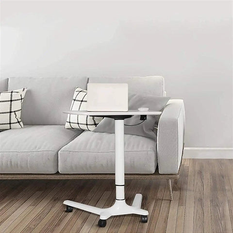 Rock Solid Rolling Laptop Cart With Height Adjustable Standing Desk And Smooth Glide Wheels For Bed Sofa Gaming Or Home Office Flex Setup, white mobile desk beside a grey couch.