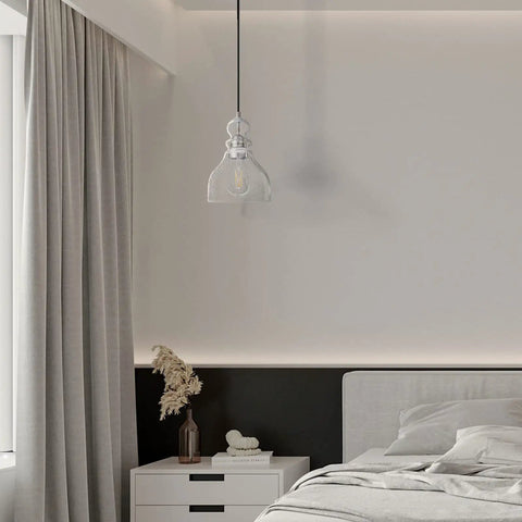 Bedroom view with Two Pack Pendant Lights With 6.5 Inch Hand Blown Seeded Glass And Brushed Nickel Finish above nightstand