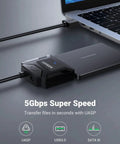 SATA To USB 3.0 External Drive Adapter Cable for 3.5 and 2.5 Inch SSD HDD connected to laptop, showcasing UASP and 5Gbps transfer speed.
