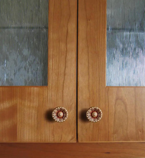 Six Pack Vintage Floral Cabinet Knobs delivering a straight up vintage vibe on wooden cabinet doors.