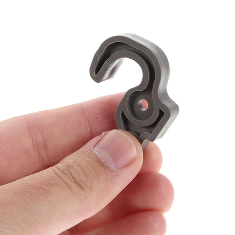 Sleek Plastic Fridge Door Stopper With Reliable Catch Hook For Modern Kitchens, Universal Freezer Latch Replacement held in hand.