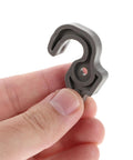 Top Tier Black Plastic Refrigerator Door Catch Buckle That Slams Shut Securely For Your Modern Kitchen, holding gray latch in hand.