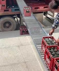 Heavy Duty 50 By 300 Centimeter Non Powered Roller Conveyor For Beefy Warehouse Handling Unloading And Transport In Delivery And Logistics Applications, shown loading crates