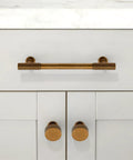 Antique Brass Cabinet Knobs 10 Pack 28mm Round Single Hole Drawer Pulls For Kitchen Cabinets And Furniture installed on white cabinet