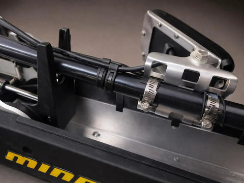 Outdoor UV Resistant Rubber Cable Zip Tie Mount Kit installed with black nylon mounts on a tubular frame in an outdoor setting