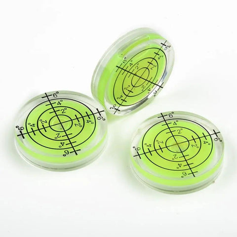 Three 32mm Circular for spirit Level Bubble for Furniture Placement and with clear casing and green liquid for accurate leveling.