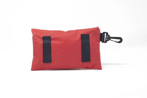 Front view of red Cubix Safety First Responder Kit pouch with two black webbing straps and a side clip