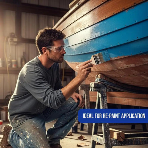 Man using paint brush on boat, ideal for repaint application, showcasing Paint Brush Set Two Pack With A Three Inch Flat Brush And Two And A Half Inch Angle Sash Brush For Cutting In Walls, Great For Home Diy Projects, Budget Friendly, High Quality Bristles And Ergonomic Handle.