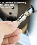 Close-up of a hand using Two Pack Stainless Steel Valve Core Wrench Set for Car and Bicycle Ultra Portable Tire Valve Disassembly Tool.