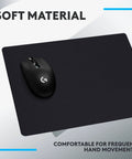 Cloth Gaming Mouse Pad With Moderate Friction For Precise Sensor Tracking Non Slip Mat For Mac And PC, shown with mouse on black surface