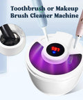 Toothbrush and makeup brush cleaner machine with digital display and two brushes inserted