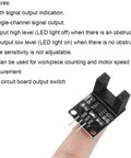 LM393 H2010 infrared photoelectric sensor module held on fingertip, features list on left, DIY friendly with 10mm slot and Dupont cable