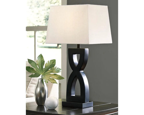 Amasai Contemporary 29 Inch Sculptured 3-Way Table Lamp Set of 2 in Black with Resin Base and Rectangular Hardback Shade on table.