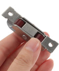 Heavy Duty Stainless Steel Double Roller Sliding Window Sash Pulley Hardware Four Pack Replacement Wheels showing a small pulley in hand.