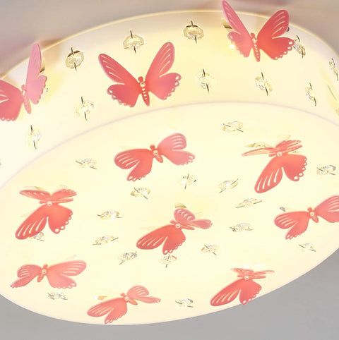 LED Kids Flush Mount Ceiling Light With Pink Butterfly Deco Crystal Drum Chandelier For Girls Bedroom Kids Room Kindergarten Decor Eye Friendly Soft White Light features pink butterflies on acrylic shade.
