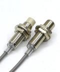 TR12 4AC Normal Close Motion Detection Sensor Switch Inductive Proximity Sensor For Automation And Industrial Control Systems The Workhorse Go To Choice For Door Interlocks And Conveyor Line Monitoring Built To Last. two threaded metal inductive sensors with cables