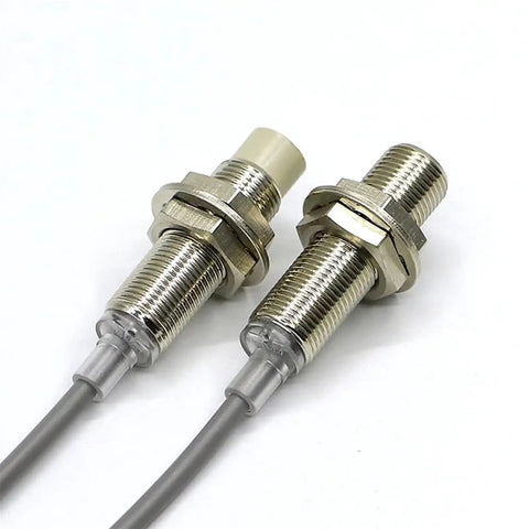 TR12 4AC Normal Close Motion Detection Sensor Switch Inductive Proximity Sensor For Automation And Industrial Control Systems The Workhorse Go To Choice For Door Interlocks And Conveyor Line Monitoring Built To Last. two threaded metal inductive sensors with cables