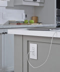 Screwless 1 Gang Decorator Wall Plates 20 Pack low profile snap on design installed on kitchen island outlet