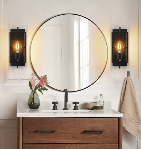 Bathroom with Set Of 2 Farmhouse Rustic Wall Sconces With Seeded Glass Lampshades In Matte Black Industrial E26 Hardwired, mirror between them.