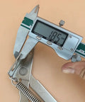 Measuring with a caliper showing 185mm for Top Shelf Set Of Two Heavy Duty Spring Hinges For Folding Sofa And Bed 80 Degree Cabinet Door Lift Support.