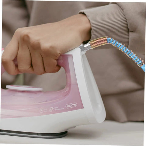Person using steam iron with High Pressure Steam Hose Tube For Professional Steam Irons, High Temperature Resistant, sky-blue