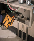 Insulated Long Nose Side Cutter Pliers, 1000V Rated and VDE Certified in use by electrician inside junction box