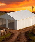 Tough As Nails Heavy Gauge Metal Garage Barn Shed With Reinforced Steel Frame For Rv Pickup Truck Atvs Boat Lawn Mower Garden Tools And Backyard Storage Setup in sunset