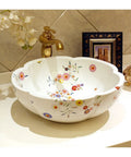 Handmade Ceramic Vessel Sink With Snazzy Floral Patterns For Above Counter Vanity Basins In Fresh Modern Bathrooms White Flower Wash Bowl with colorful flowers.