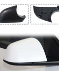 One Pair Premium Abs Side View Mirror Covers For Tesla Model Y showing black ABS shell and underside detail.