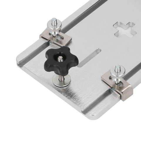 Close-up of Electric Jig Saw Flip Board With Aluminum Router Table Insert Plate showing hardware and center hole bushing.
