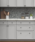 Round Matte Black Kitchen Cabinet Knobs 10 Pack Durable Drawer And Dresser Knobs for Cabinets and Bathroom Drawers One And One Eighth Inch Easy Install Slick Modern Hardware By Hickory Hardware installed on white cabinets