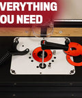 Rout-R-Lift 3 5XT Router Lift System with phenolic top plate and twist lock inserts shown on a workbench.