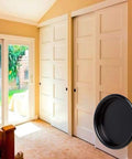 4 Pack Closet Door Finger Pulls 2 1 8 Inch Black Round Insert Door Handle on sliding barn doors in cozy room setting.