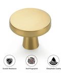 Close-up of a brushed gold knob with anti-fingerprint, scratch resistance, and oleophobic coating features, 30 Pack Solid Kitchen Cabinet Round Knobs And Dresser Pulls Gold Brushed Brass Cupboard Hardware For Doors And Drawers One And One Quarter Inch Top Diameter Beefy Heavy Duty Build For Long Lasting Use