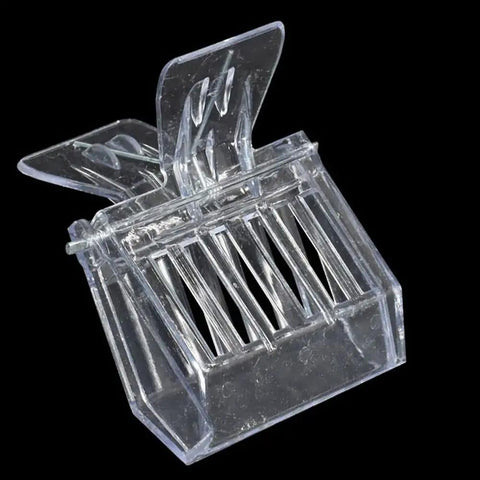 Transparent plastic bee queen cage catcher clip for one hand use, part of a 12 pack beekeeping kit, shown against black background.